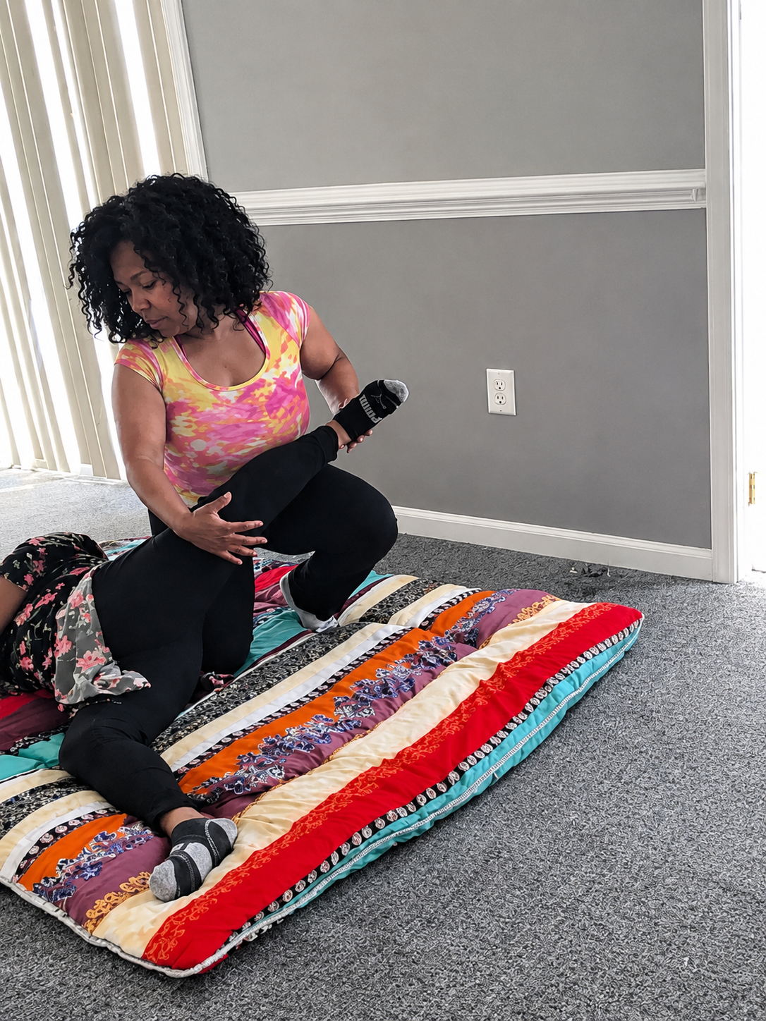 Assisted stretch therapy floor session